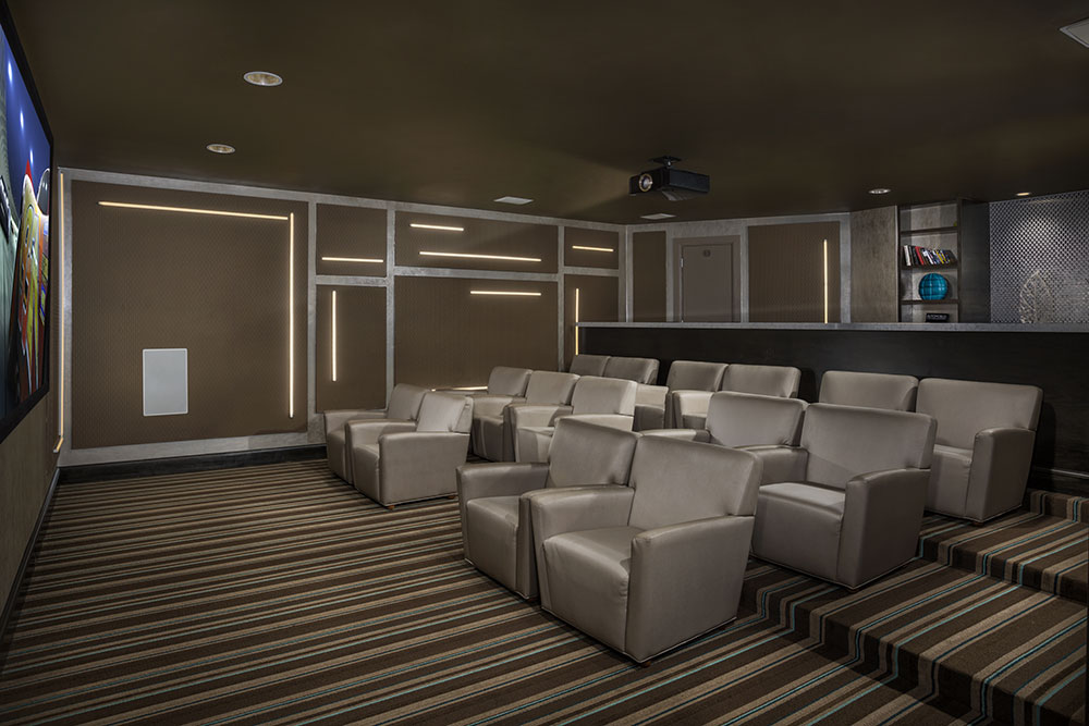The Bowen apartments in Bowie, MD resident movie theater with big cozy chairs
