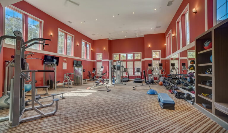 Bowen fitness center with cardio machines, weight machines and free weights.