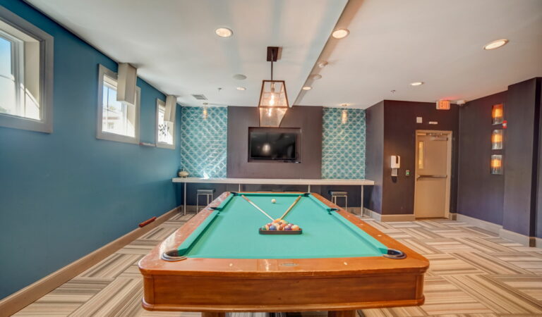 Bowen game room with billiards